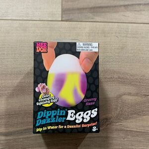NeeDoh Dippin' Dazzler Eggs - Groovy Haze Color-Changing Squishy Egg